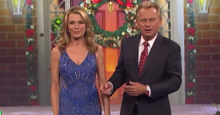 wof 1 1.jpg?resize=412,275 - Vanna White's Hilarious Wardrobe Malfunction! The Wheel Of Fortune Hostess Walked Around With Gift Attached To Her Dress