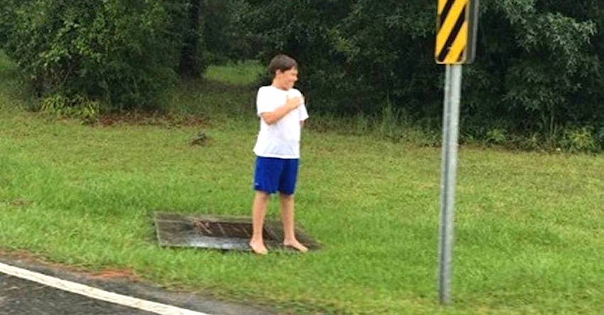 Kaiden procession copy 1.jpeg?resize=412,275 - Little Boy Stood In Pouring Rain For 30 Minutes To Honor WWII Veteran's Funeral Procession