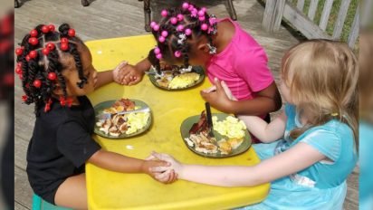 kids pray over breakfast 412x232.jpg?resize=412,232 - Mother Proudly Shared Picture Of Her Daughters Holding Hands While Praying Before The Meal