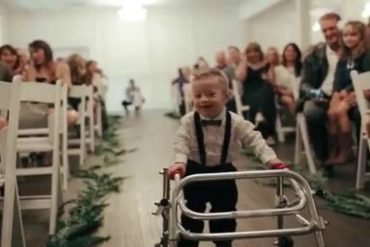baby aisle surprise 412x275.jpg?resize=412,275 - Young Ring Bearer With Down Syndrome Proudly Walked Down The Aisle