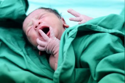 baby born in amniotic sac 1 412x275.jpg?resize=412,275 - Baby Was Born But Mother Did Not Hear Her Newborn Crying, She Then Heard Nurses Whispering To Each Other