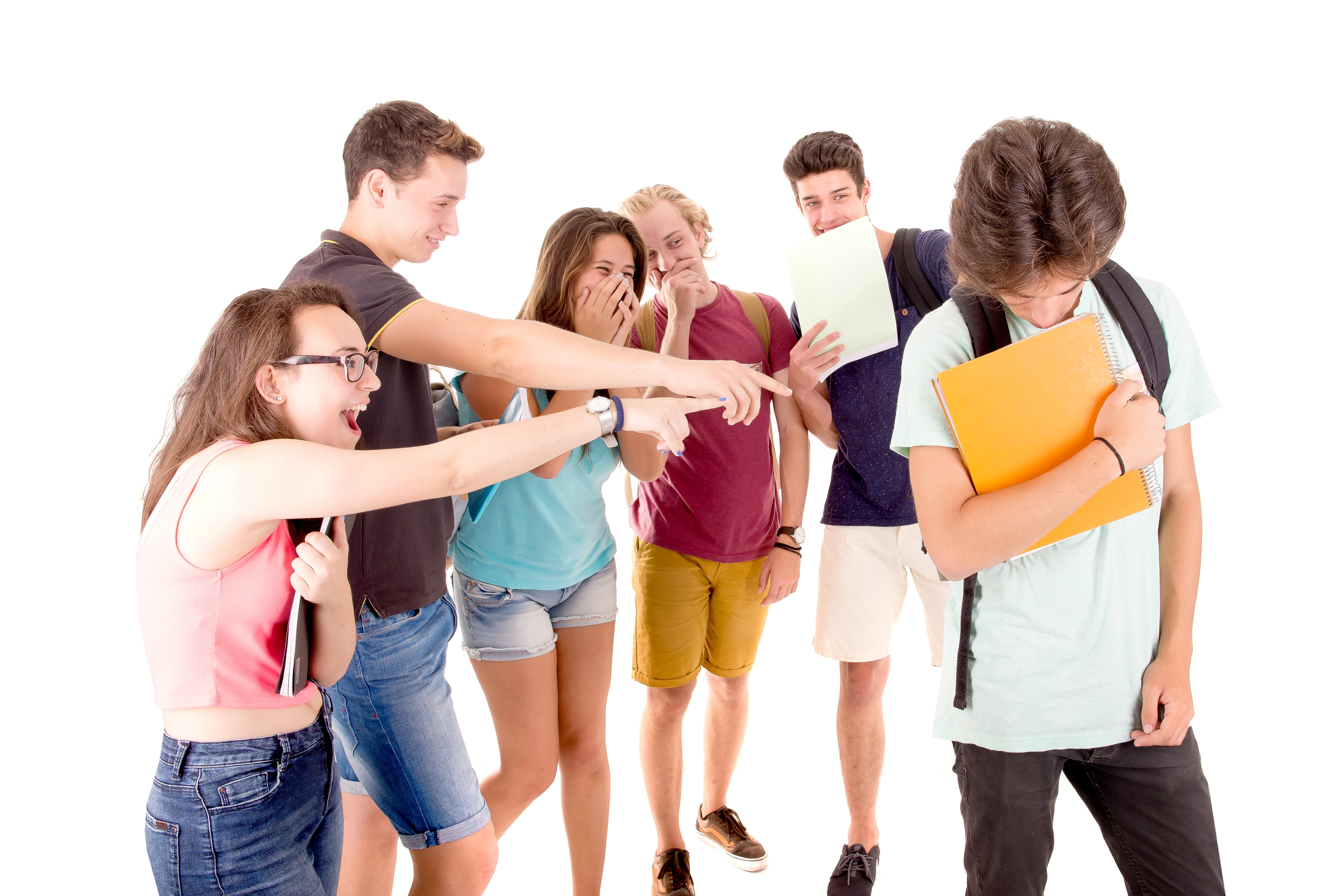teenagers bullying another isolated in white