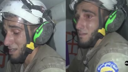 rescue worker saves baby 412x232.jpg?resize=412,232 - Rescue Worker Broke Into Tears As He Pulled A Baby From Rubble In Syria During The War