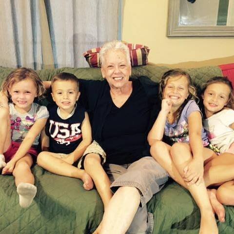 Pamela with her other 4 grandchildren. Image via Pamela McMahon / Facebook