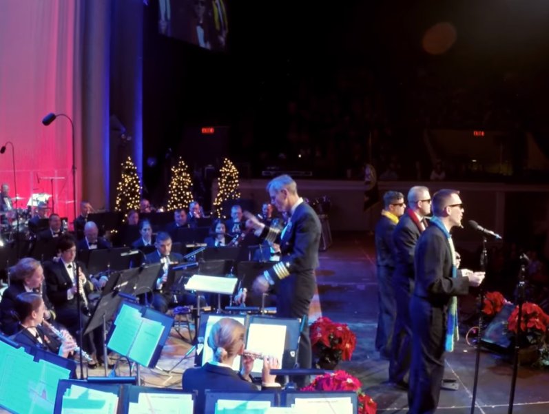 Navy Band Performs White Christmas, Man In Yellow Scarf Surprises The
