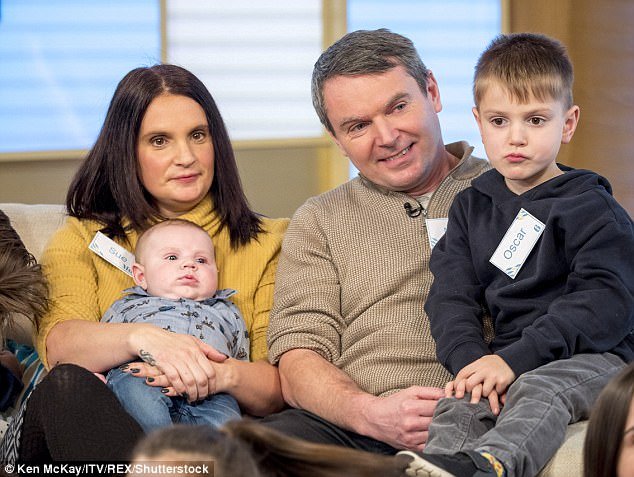 Sue and Noel Radford welcomed their twentieth child Archie, pictured on his mother