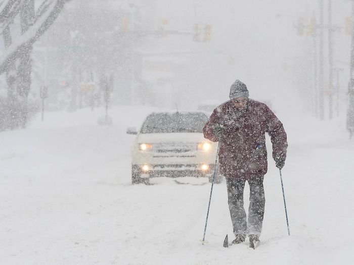 Man Skis On A Street