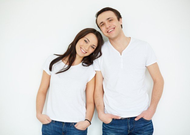 couple-with-white-shirts-and-jeans_1098-2090