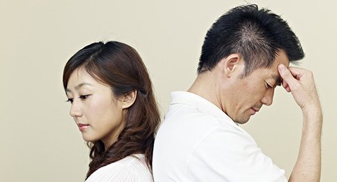 young asian couple having relationship difficulties.