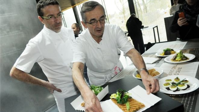 French chef Michel Bras and his son Sebastien present a dish at Bras