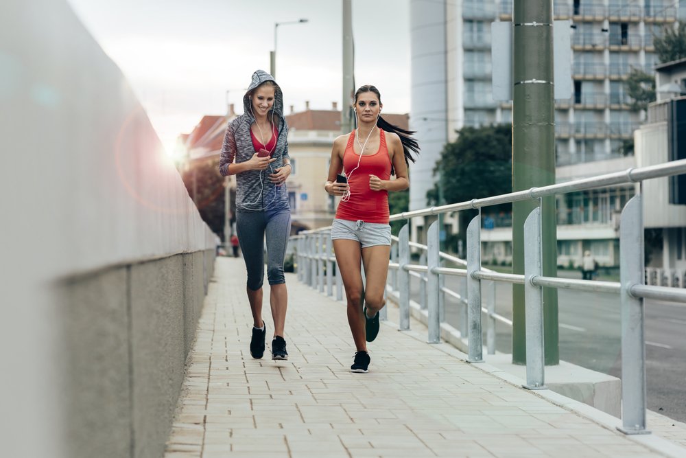 Active female joggers running outdoors