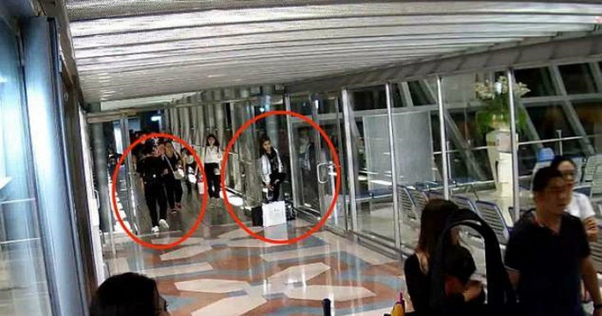 1 320.jpg?resize=412,275 - Filmagem de uma mulher sendo sequestrada no aeroporto, sequestradores a coagiram para segui-los em silêncio