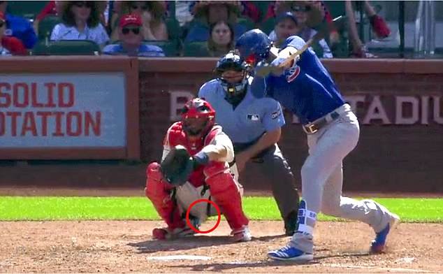 Cubs batter Kris Bryant a tipped 102-mph pitch from reliever Jordan Hicks into Molina