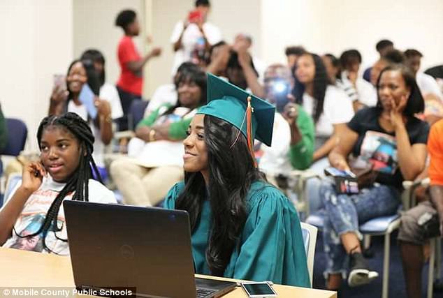 Pettway streamed live into the ceremony by video chatting on her computer, with her were about 40 proud family members in the hospital conference room