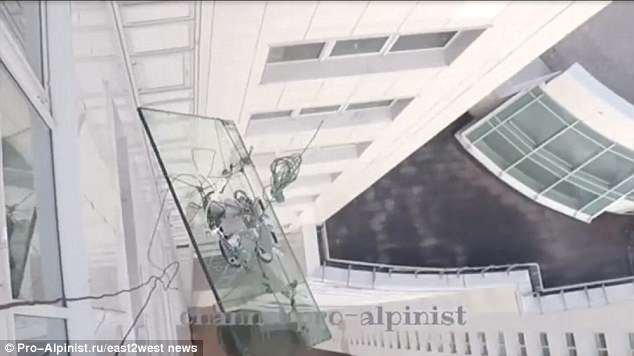 A cable snapped as the construction workers wearing GoPro cameras were about to fix the window unit into place in the skyscraper Moscow City business district.