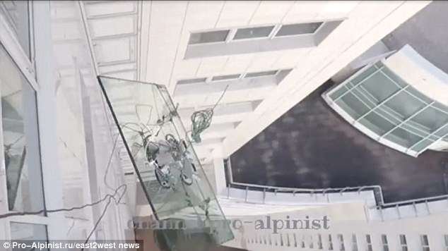 A cable snapped as the construction workers wearing GoPro cameras were used to fix the window unit into the skyscraper.