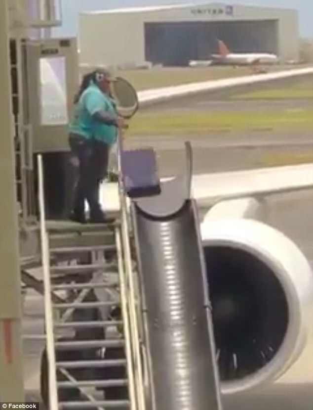 The bags are thrown in the air before landing on the chute at speed