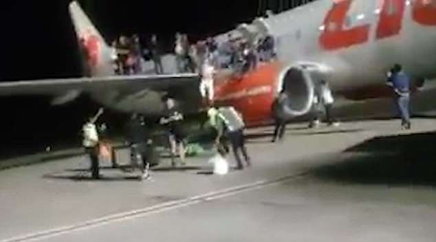Panic:Â At least ten people were injured - most with broken bones and head wounds amid chaos as the plane was preparing to take off from Supadio airport in Pontianak city West Kalimantan