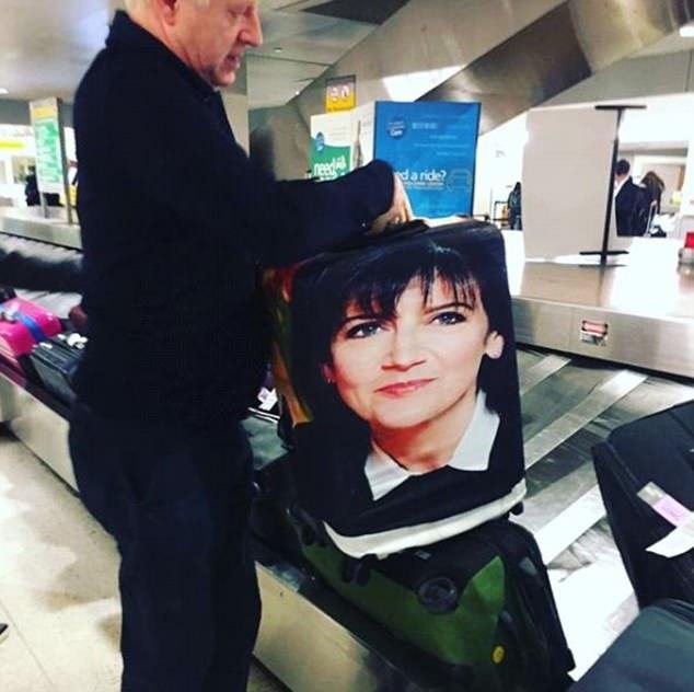 The Four Weddings and a Funeral writer was later pictured looking unimpressed as he picked the bag off the carousel in New York