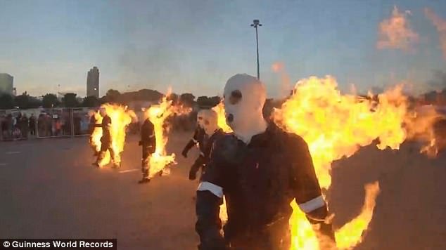The daring stuntmen wore fire-proof costumes and gel to protect themselves from the flames
