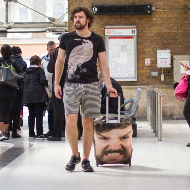 Holidaymakers take to covering their suitcases with massive pictures of themselves