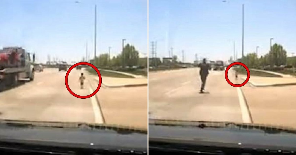 aa side.jpg?resize=412,232 - Brave Cop Risked His Life To Save Toddler Who Ran Across The Busy Highway