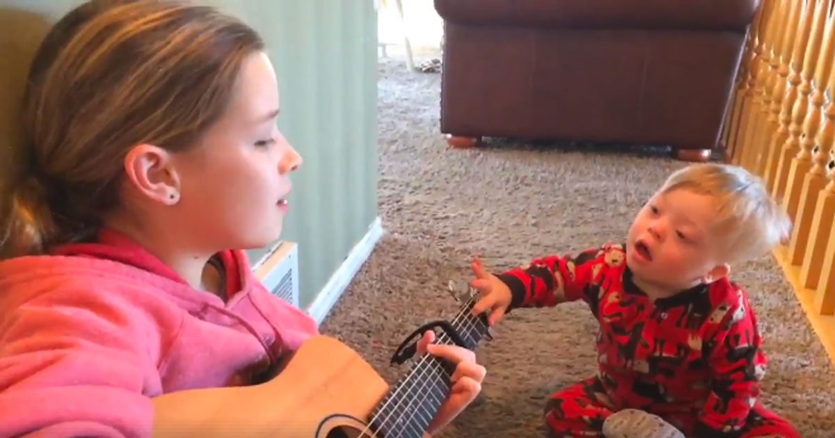 toddler down syndrome sings you are my sunshine featured.jpg?resize=1200,630 - Down Syndrome Toddler Can Barely Speak Until Sister Plays 'You Are My Sunshine'