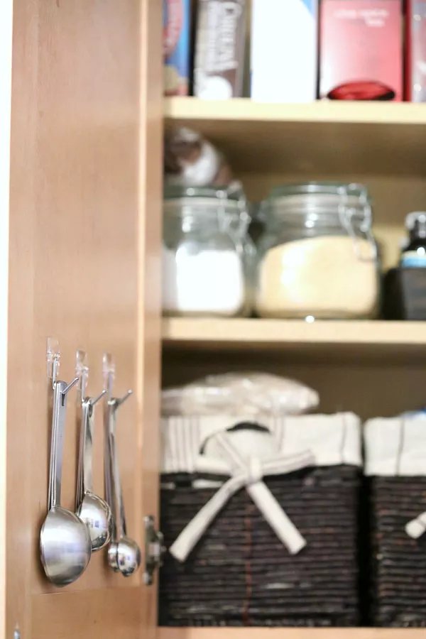 Hang measuring spoons on the inside of your pantry door.