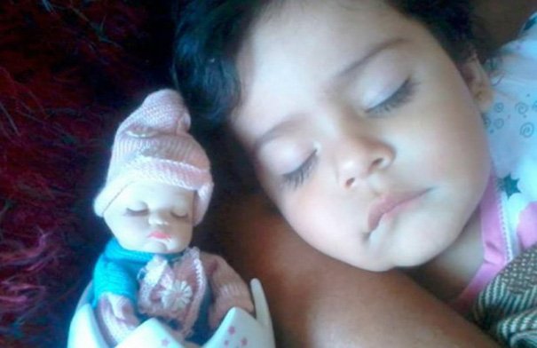 Girl With Her Look Alike Doll
