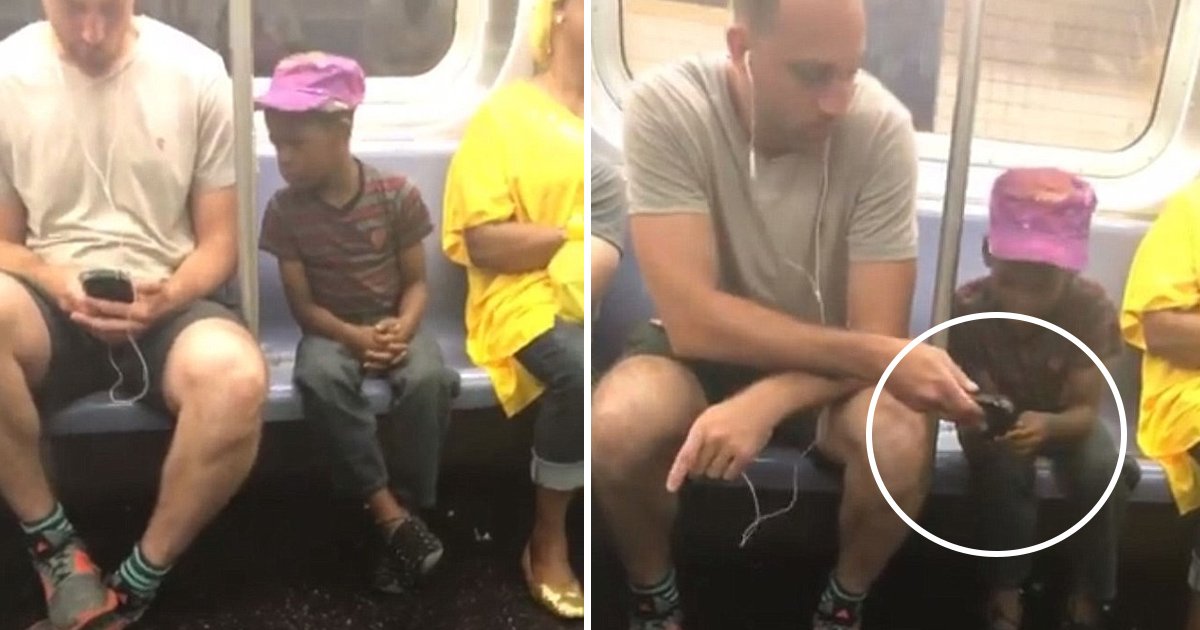 ggag.jpg?resize=412,232 - Heartwarming Incident Happened In The NYC Subway When A Strange Man Gave His Phone To Little Guy So That He Can Play Games On It