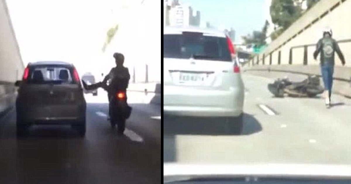 sau paulo brazil motorcyclist car kick 4.jpg?resize=412,232 - Un motard à São Paulo, au Brésil, a été surpris en train de donner un coup de pied à une voiture dans un accès de rage au volant - puis il est tombé de sa moto