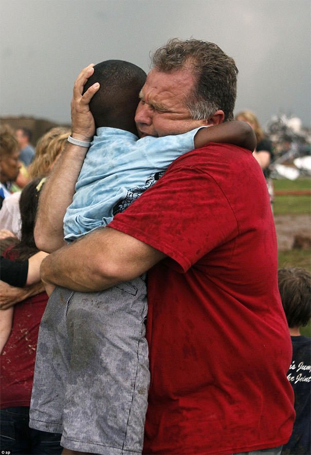 A Teacher Finds One Of His Students Among The Rubble Caused By The Tornado In Moore, Ok