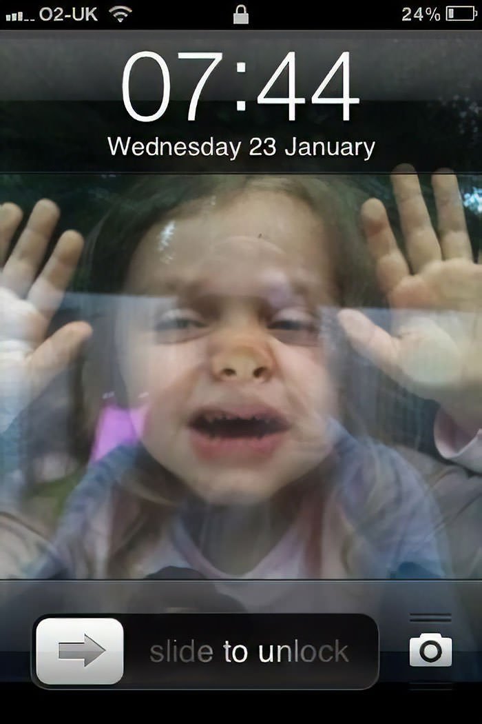 1) Get Your Child To Squash Up Against A Window 2) Take Photo 3) Set As Phone Background 4) Child Is