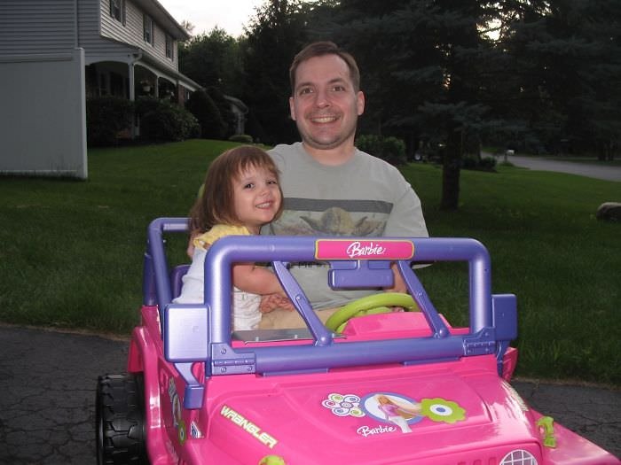 One Benefit Of Being A Little Person Is That You Can Drive Your Daughter Around In Her Barbie Jeep When She