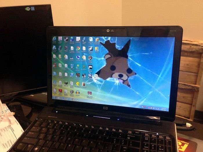 A Corporate Executive Hands Me His Sons Laptop And Asks Me To Do Some Maintenance. I Was Greeted With This Desktop