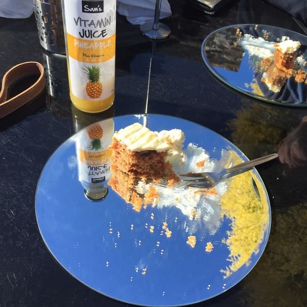 Carrot Cake Served On Round Mirrors