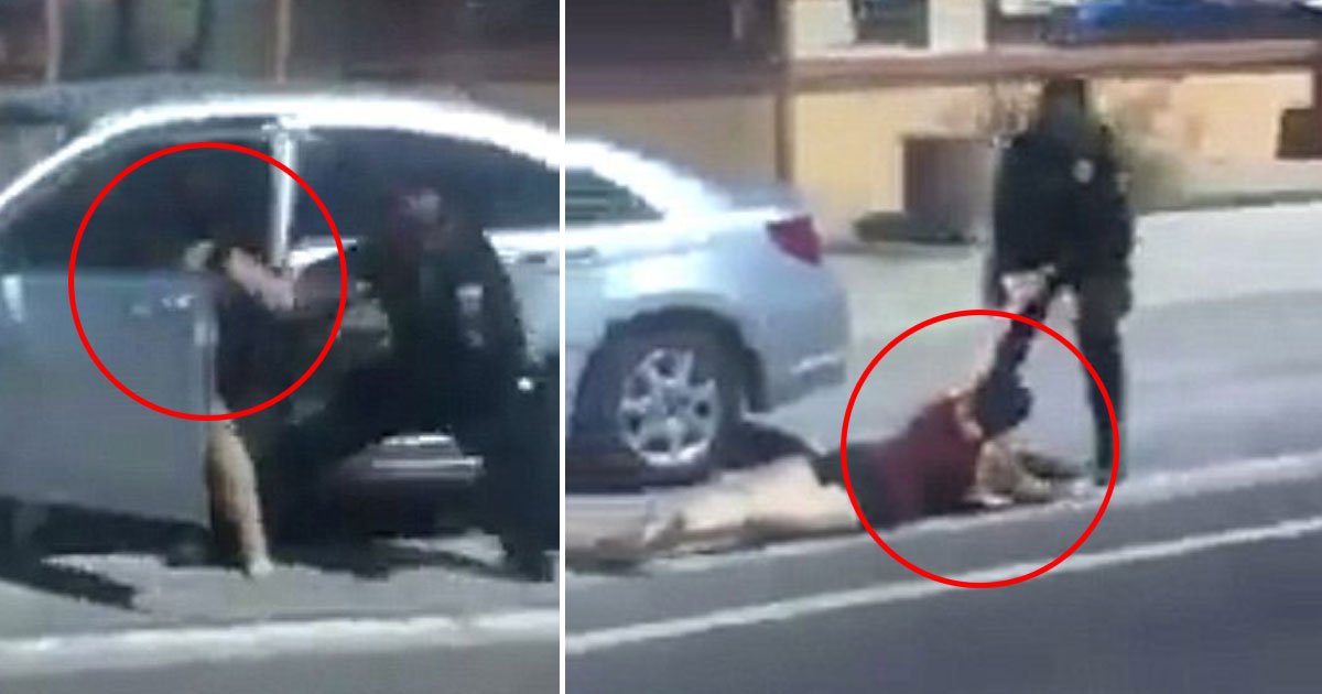 cop punches woman.jpg?resize=1200,630 - Une vidéo montre un officier frappant une femme non armée et la traînant dans la rue pendant un arrêt de la circulation
