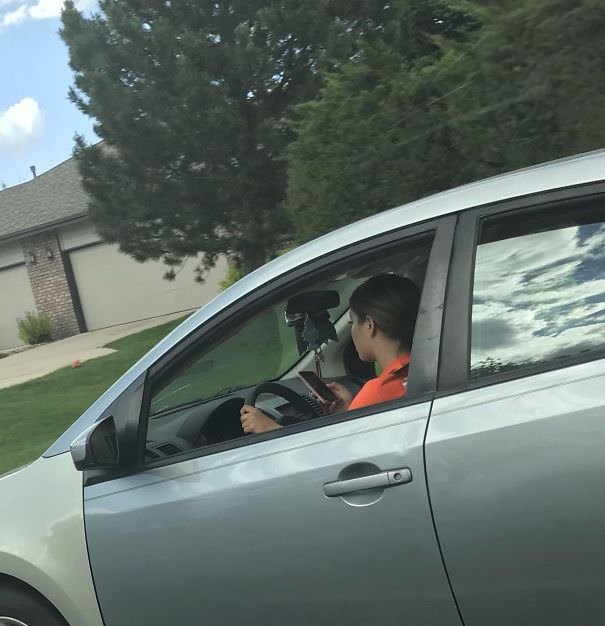 She Was Snapchatting While Driving (40 MPH Road (64,4 KPH)). She Also Had A Little Brother In The Passenger Seat While Doing This