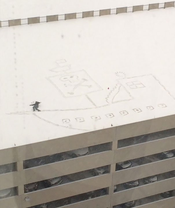  Guy Working On The 13th Floor Looked Out The Window At The Top Of The Parking Garage, And Had An Idea. This Is The Result