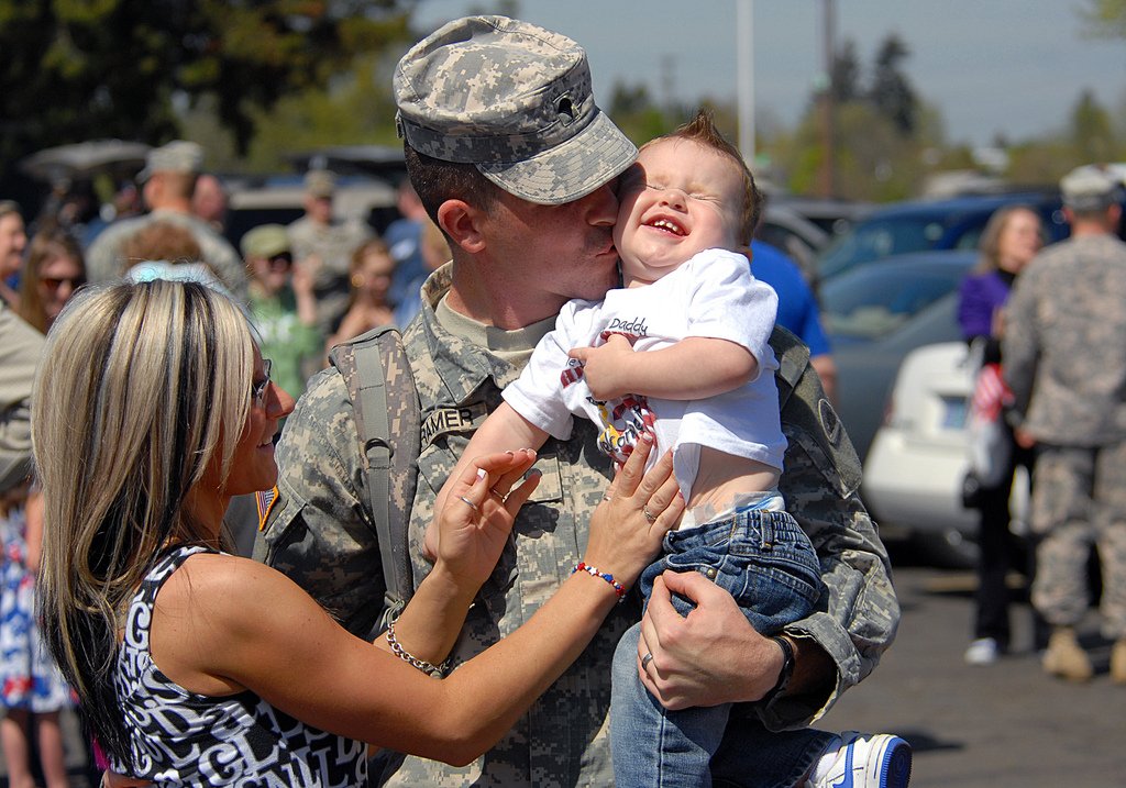 Image result for soldier reunited family