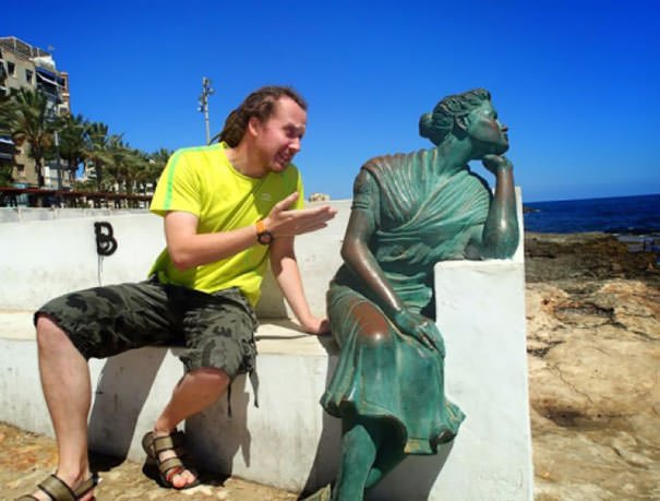  Funny People posing with statues 