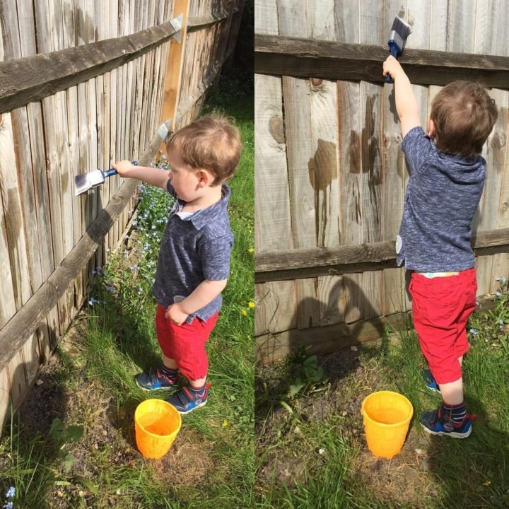 21 Best Mom Hacks - Keep your toddler busy by letting them paint the fence "toddler style" with water.