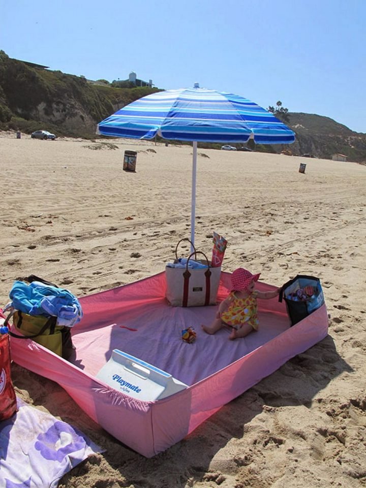 21 Best Mom Hacks - Place a fitted sheet with bags at each corner to keep the sand out at the beach.