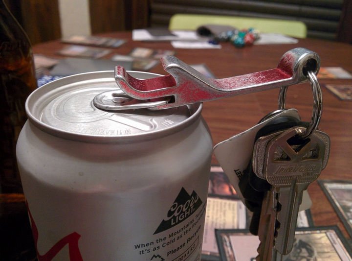 21 Everyday Life Hacks - The slot on your keychain bottle opener is for opening pop tabs.