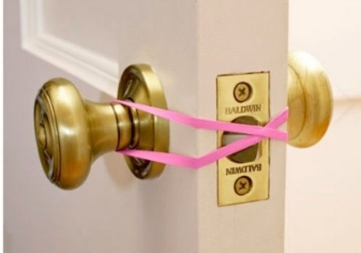 24 Life Hacks for Kids - Prevent kids from locking the door accidentally by using a simple rubber band.