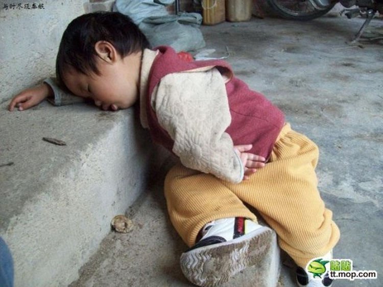 25 Kids Sleeping in the Strangest Places - These stairs will do.