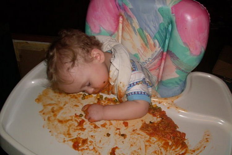 25 Kids Sleeping in the Strangest Places - Napping after too many carbs.