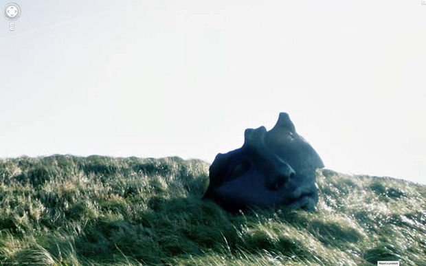 25 Weird Things Found on Google Maps - Why is there a huge face sculpture on a hill?