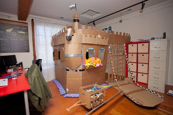 26 Funny Office Pranks - An office fort. Nice touch with the horse!
