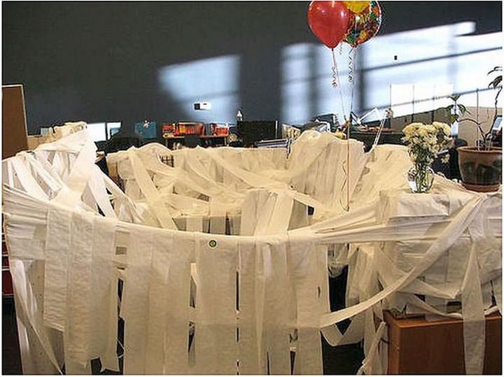 26 Funny Office Pranks - Toilet papering the cubicle.